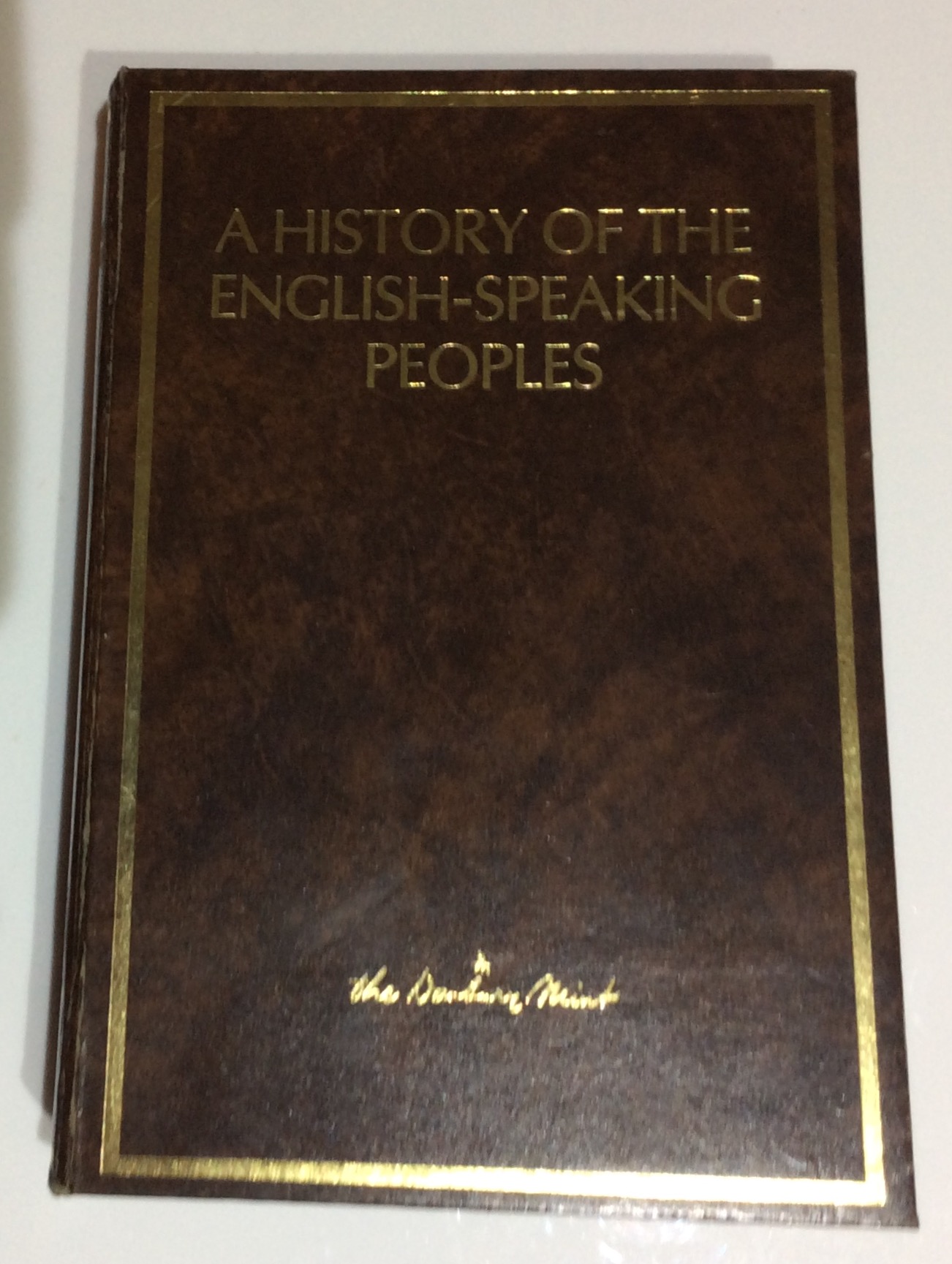 A CASED 20TH CENTURY SILVER GILT PROOF COIN SET Titled 'A History of the English Speaking Peoples'