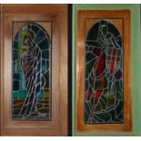 A PAIR OF EARLY 20TH CENTURY STAINED GLASS PANELS George & Dragon and the Madonna and child,