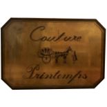 AN ORIGINAL EARLY 20TH CENTURY DOUBLE SIDED HEAVY BRASS SHOP SIGN Couture Pintemps, in a wrought