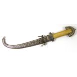 JAMBIYA, A TRADITIONAL ARABIC/NORTH AFRICAN DAGGER Bone handle grip and scabbard with white metal