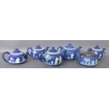 A COLLECTION OF SIX LATE 19TH/EARLY 20TH CENTURY WEDGWOOD JASPERWARE TEAPOTS Circular forms with