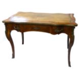A 19TH CENTURY FRENCH KINGWOOD WRITING TABLE The brass banded cartouche top with leather writing