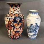 A 19TH CENTURY CHINESE IMARI DECORATED VASE Along with a blue and white vase. (tallest 37cm)