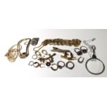 A COLLECTION OF SILVER AND COSTUME JEWELLERY Including a silver magnifying glass on a chain and a