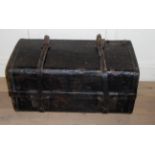 A VINTAGE FRENCH LEATHER BOUND TRAVEL TRUNK Opening to reveal a black leather interior,