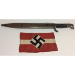 A WORLD WAR II GERMAN ARMY PARADE BAYONET With textured grip and combat bayonet scabbard, together