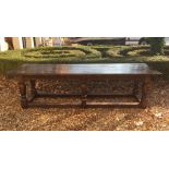 AN 18TH CENTURY AND LATER OAK REFECTORY TABLE With plank top, raised on square tapering and fluted