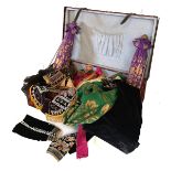 A COLLECTION OF INDONESIAN TOPANG THEATRE DANCE COSTUMES Bright coloured fabrics woven with gilt