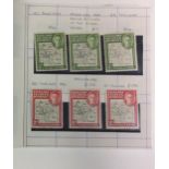 AN EARLY 20TH CENTURY POSTAGE STAMP ALBUM Including ten featuring King George VI commemorating the