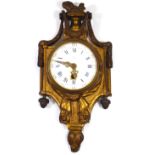 A 19TH CENTURY FRENCH GILT METAL CARTEL CLOCK The painted enamelled dial with Roman Numeral