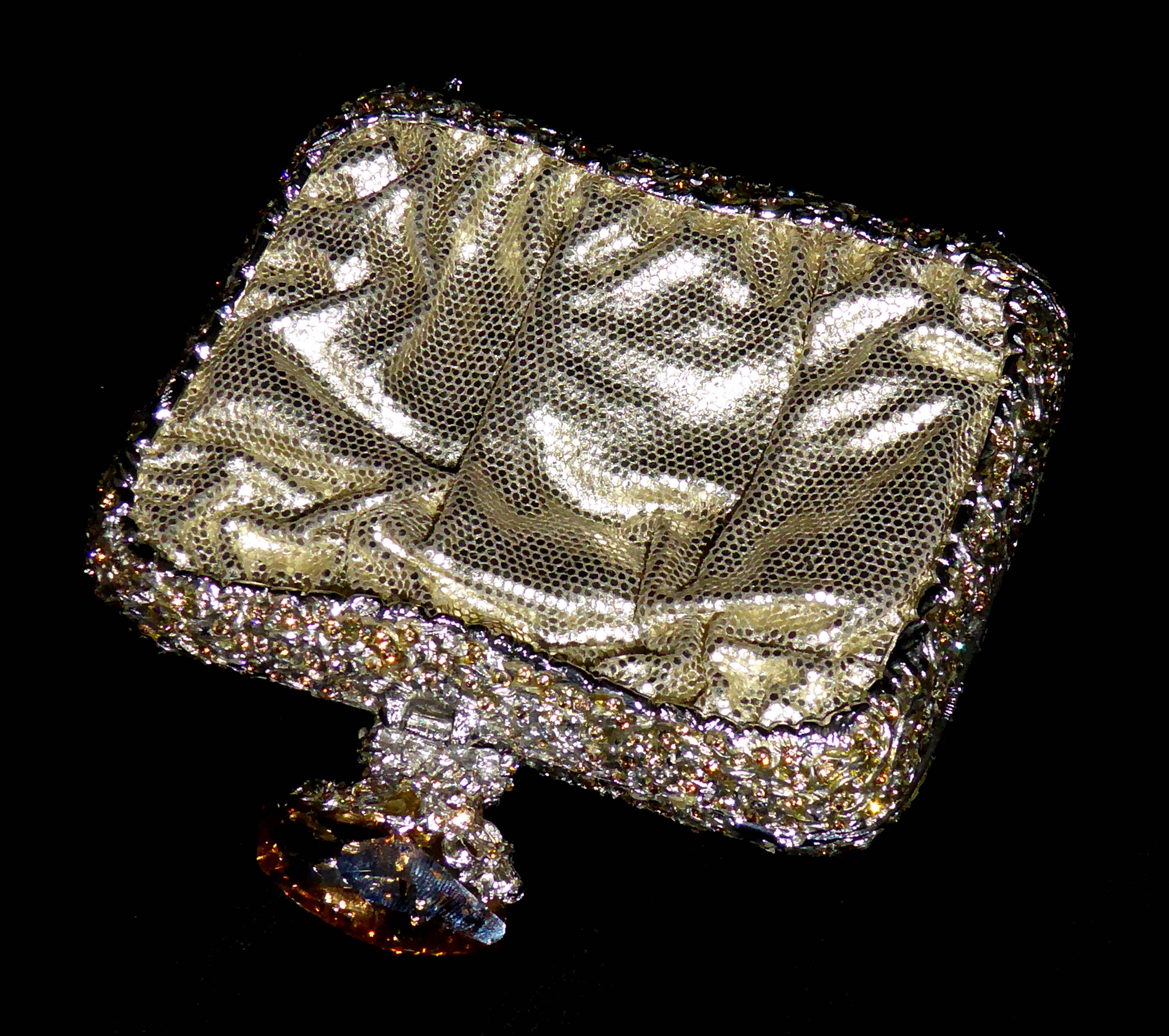 CLARA KASAVINA, NEW YORK, A GOLD LEATHER EVENING BAG The metal frame encrusted with gold