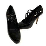 MIU MIU, A PAIR OF BLACK PATENT LEATHER DOUBLE STRAP MARY JANE HEELS (size 35).