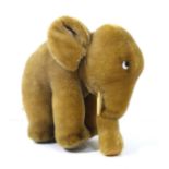 STEIFF A 20TH CENTURY PLUSH MOHAIR TOY ELEPHANTIn standing pose with metal button to left ear. (