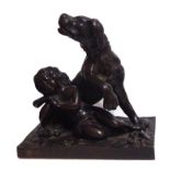 A BRONZE GROUP OF A BOY AND A DOG Raised on a naturalistic base (12cm)