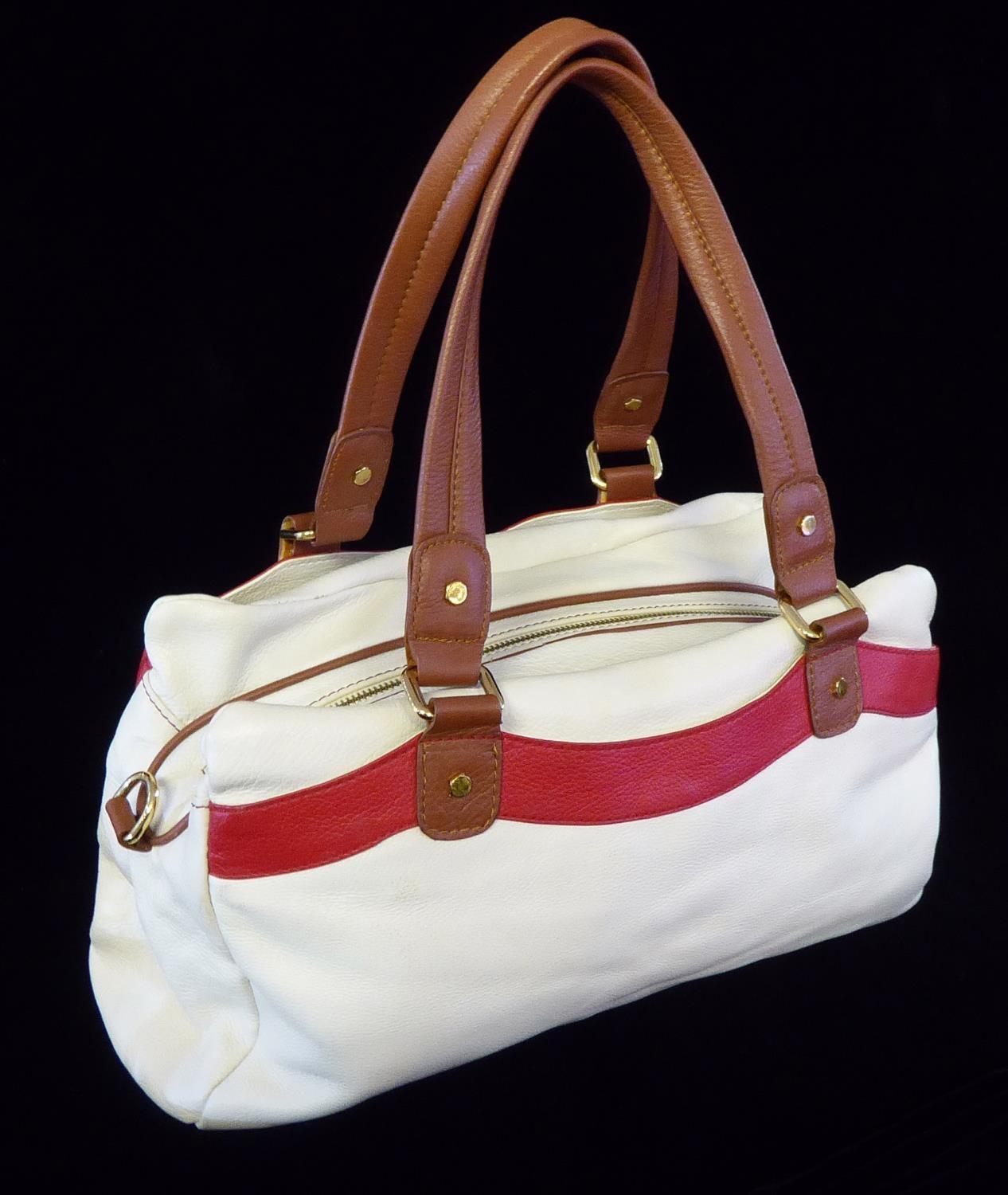 MARC JACOBS, A VINTAGE WHITE LEATHER HANDBAG With brown handles and red band, bearing label 'Marc, - Image 3 of 3