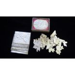A BOXED 19TH CENTURY FRENCH CONTINENTAL SILVERED CARD JIGSAW Featuring Napoleonic battle scenes. (
