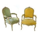 A PAIR OF 19TH CENTURY FRENCH DESIGN PAINTED CARVED WOOD AND UPHOLSTERED OPEN ARMCHAIRS With