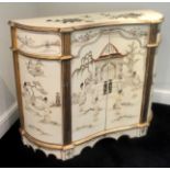 A CONTEMPORARY CHINOISERIE, GILT HEIGHTENED AND CREAM PAINTED SIDE CABINET The twin central doors of