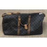 LOUIS VUITTON, A TRADITIONAL DESIGN HOLDALL (51cm x 32cm) leather shoulder strap broken