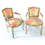 A PAIR OF 19TH CENTURY FRENCH HEPPLEWHITE CARVED WOOD PAINTED OPEN ARMCHAIRS With shaped back over