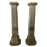 A PAIR OF 19TH CENTURY CELTIC DESIGN CARVED MARBLE TAPERING OCTAGONAL COLUMNS Raised on a steeped