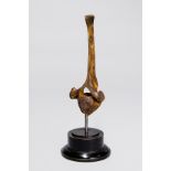 vA GIRAFFE VERTEBRAE MOUNTED ON VICTORIAN EBONISED PLINTH IN THE FORM OF A PAPERWEIGHT. (h 34cm x
