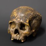 A 19TH CENTURY DAYAK TRIBE HEADHUNTERS CARVED TROPHY HUMAN SKULL.