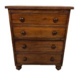 AN EARLY VICTORIAN MAHOGANY COMMODE CHEST Converted to music cabinet. (66cm x 47cm x 82cm)