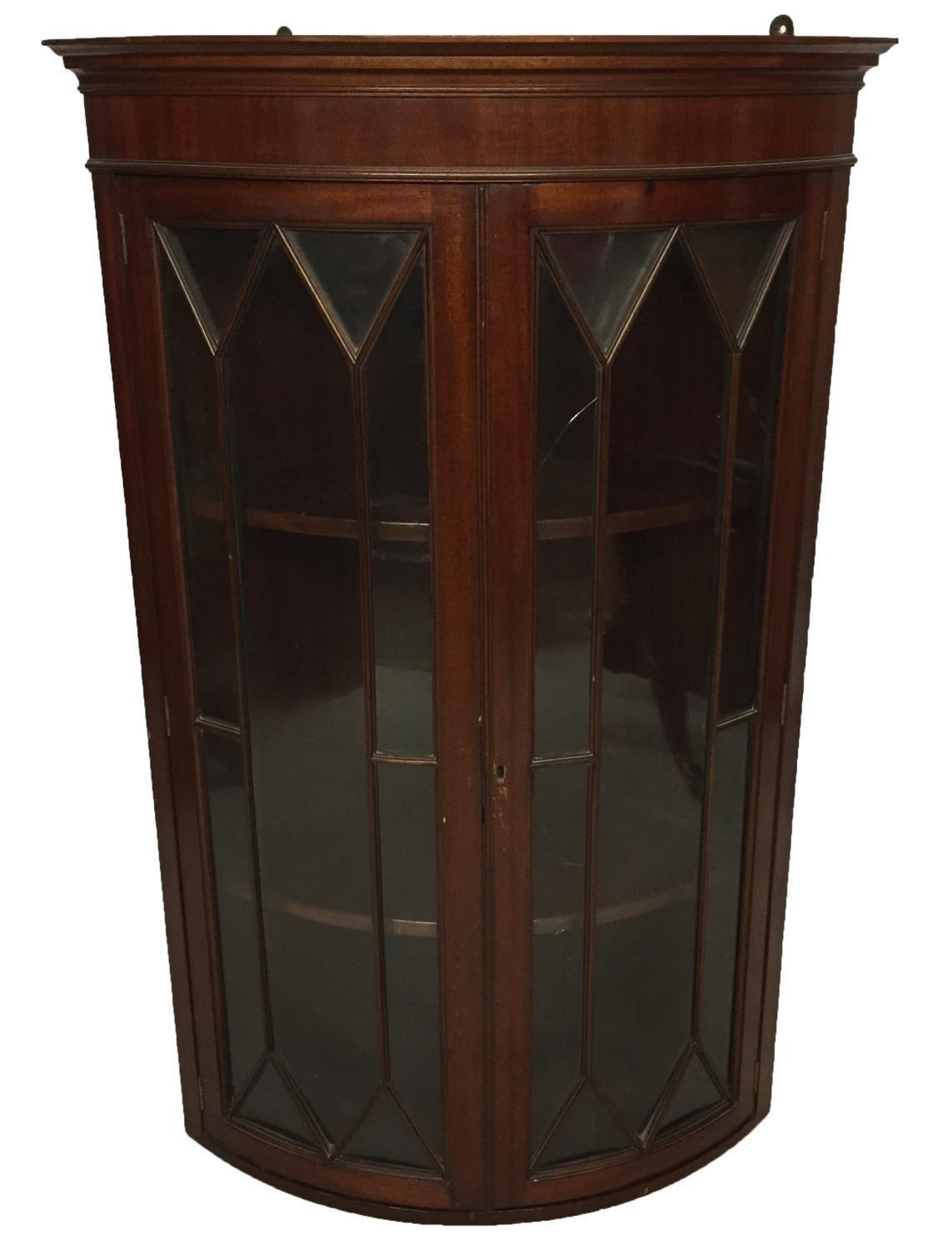 A REGENCY STYLE MAHOGANY BOW FRONTED CORNER CABINETwith two glazed doors66 x 47 x 105 cm - Image 2 of 2