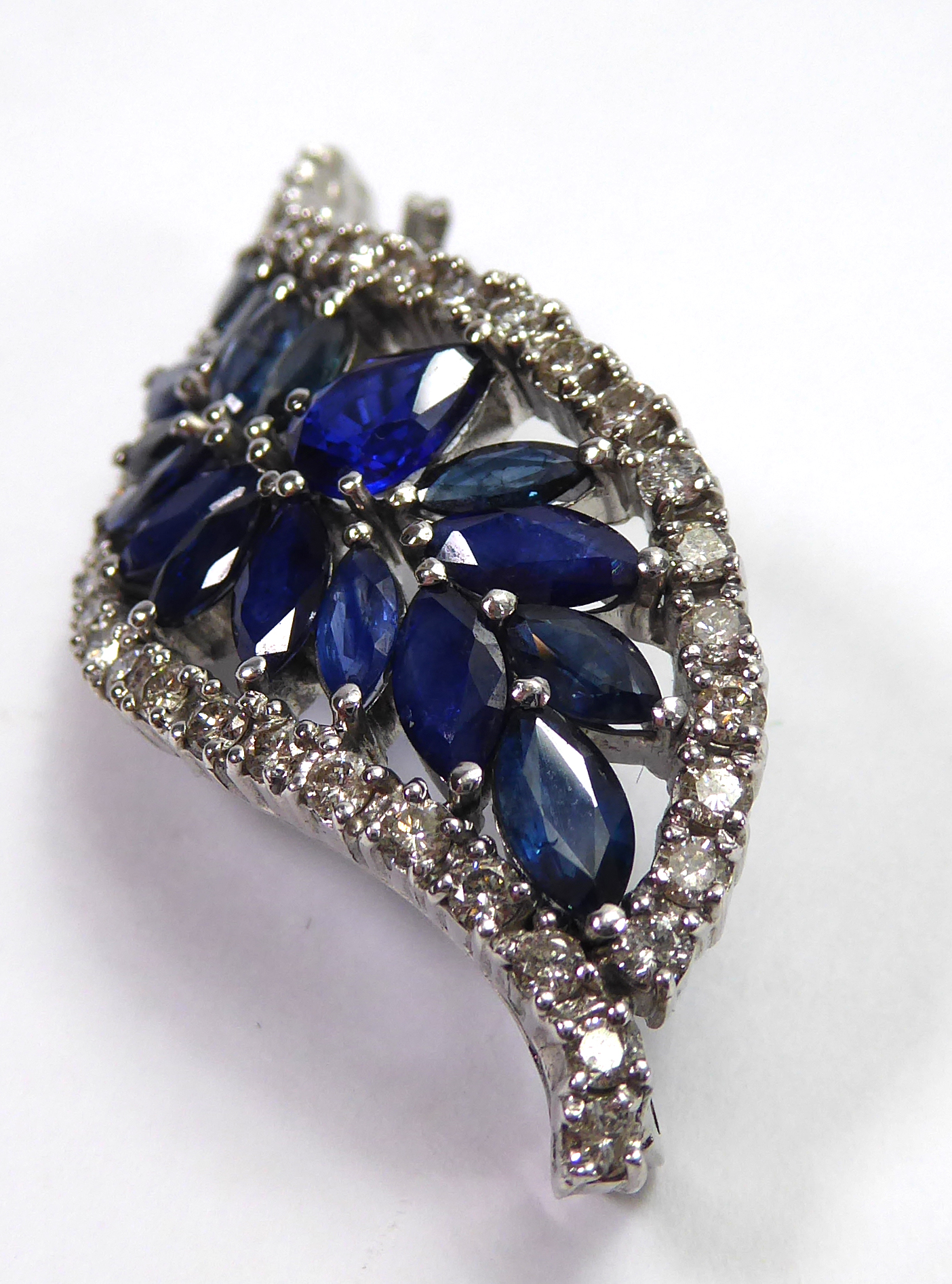 A SAPPHIRE AND DIAMOND LEAF BROOCH Set in white gold. (11.9g) - Image 2 of 11