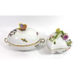 TWO HERAND PORCELAIN COVERED TRINKET BOXES Comprising an oval form box with butterfly finial and a