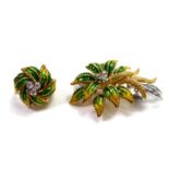 AN 18CT DIAMOND AND GREEN ENAMELLED BROOCH OF FLORAL FORM Along with matching ring. (32.6g)
