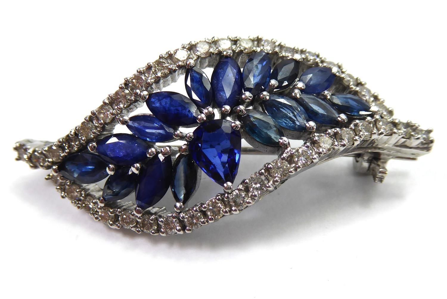 A SAPPHIRE AND DIAMOND LEAF BROOCH Set in white gold. (11.9g) - Image 9 of 11