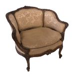 A 19TH CENTURY FRENCH WALNUT AND PARCEL GILT TUB ARMCHAIR Of generous proportions, with finely