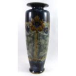 ROYAL DOULTON, AN EARLY 20TH CENTURY STONEWARE VASE Decorated on a blue ground. (36cm)