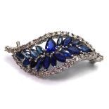 A SAPPHIRE AND DIAMOND LEAF BROOCH Set in white gold. (11.9g)