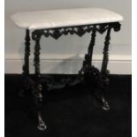 AN EARLY 20TH CENTURY CAST IRON STOOL With upholstered seat on decorative pierced base with