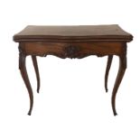 A 19TH CENTURY FRENCH MAHOGANY CARD TABLE The serpentine fold over top enclosing a Greek Key edged