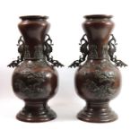 A PAIR OF FINE JAPANESE MEIJI PERIOD BRONZE TWIN HANDLED BALUSTER VASES, CIRCA 1880 Applied to