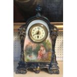 A LATE 19TH CENTURY FRENCH CHINA CASED MANTLE CLOCK With gilt and enamelled dial above a decorated