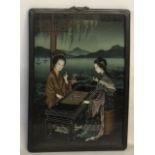 A CHINESE REVERSE GLASS PAINTING Ladies playing Weiqi. (50cm x 71cm)
