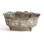 A 19TH CENTURY DUTCH SILVER BOWL Embossed with a Rococo landscape, bearing a fleur de lis mark to