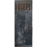 NORWICH PRISON, AN 18TH/19TH CENTURY PINE AND IRON CALD CELL DOOR With peep hole and drop flap. (