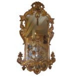 CHARLES NOSOTTI, A 19TH CENTURY NEOCLASSICAL CARVED GILTWOOD PIER MIRROR The cartouche frame flanked