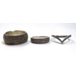 A COLLECTION OF THREE SILVER AND DIAMOND RINGS Including a wishbone design, a ring with two rows