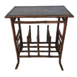 A LATE VICTORIAN JAPANNED BAMBOO MUSIC CANTERBURY TABLE The top decorated with birds amongst
