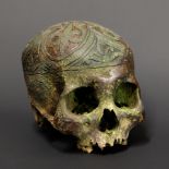 A 19TH CENTURY DAYAK TRIBE HEADHUNTERS CARVED TROPHY HUMAN SKULL.