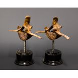 A PAIR OF GIRAFFE VERTEBRAE MOUNTED ON VICTORIAN EBONISED PLINTHS AS PAPERWEIGHTS. (each h 20cm x