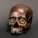 A 19TH CENTURY DAYAK TRIBE HEADHUNTERS TROPHY HUMAN SKULL.