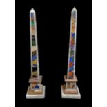 A PAIR OF ITALIAN SPECIMEN MARBLE OBELISK Of tapering form with geometric design over a stepped